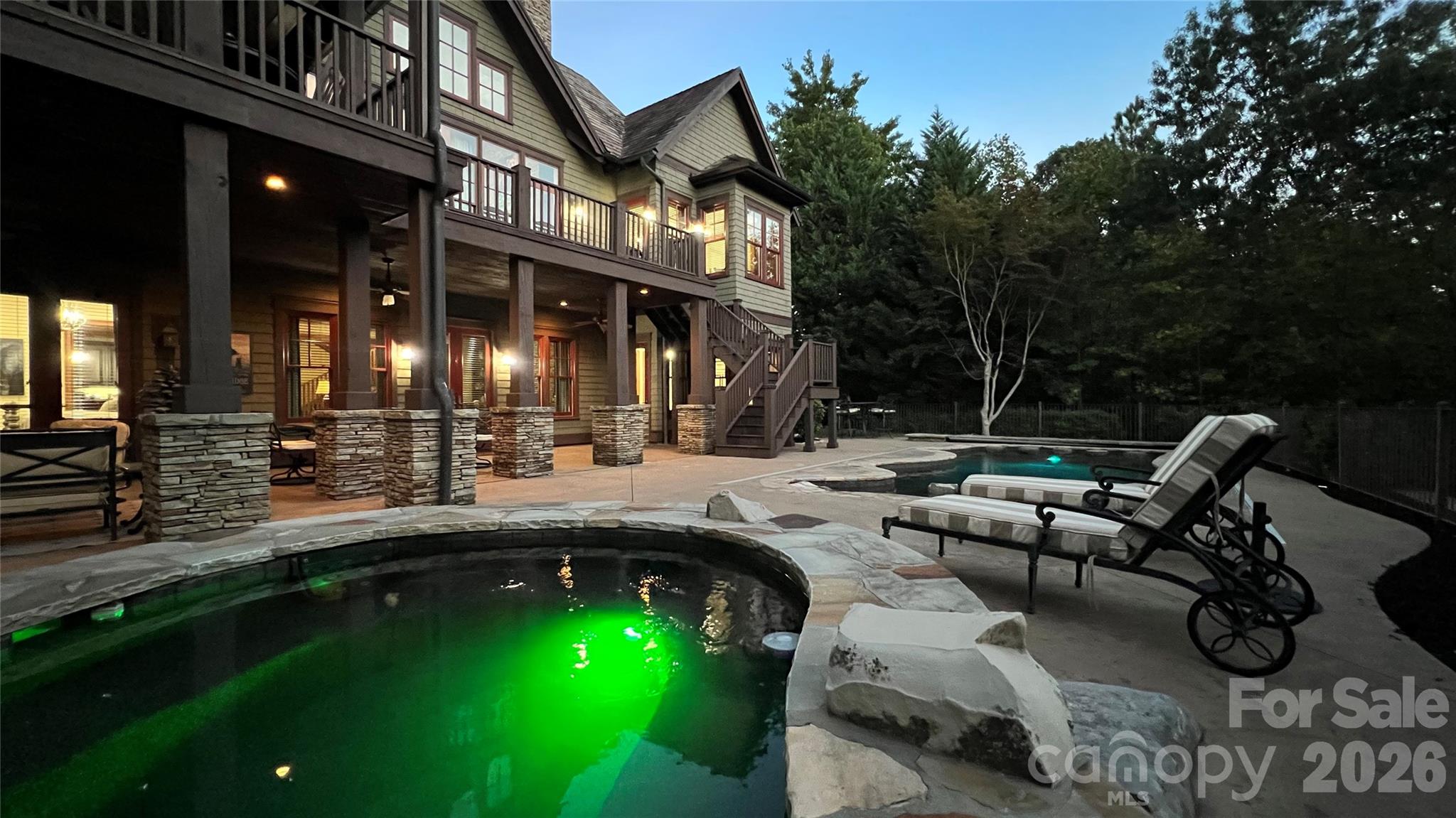 538 Chestertown Drive Mill Spring, NC 28756 - Photo 5 of 48 a swimming pool with outdoor seating and yard