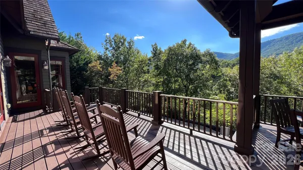 a view of a patio with wooden floor