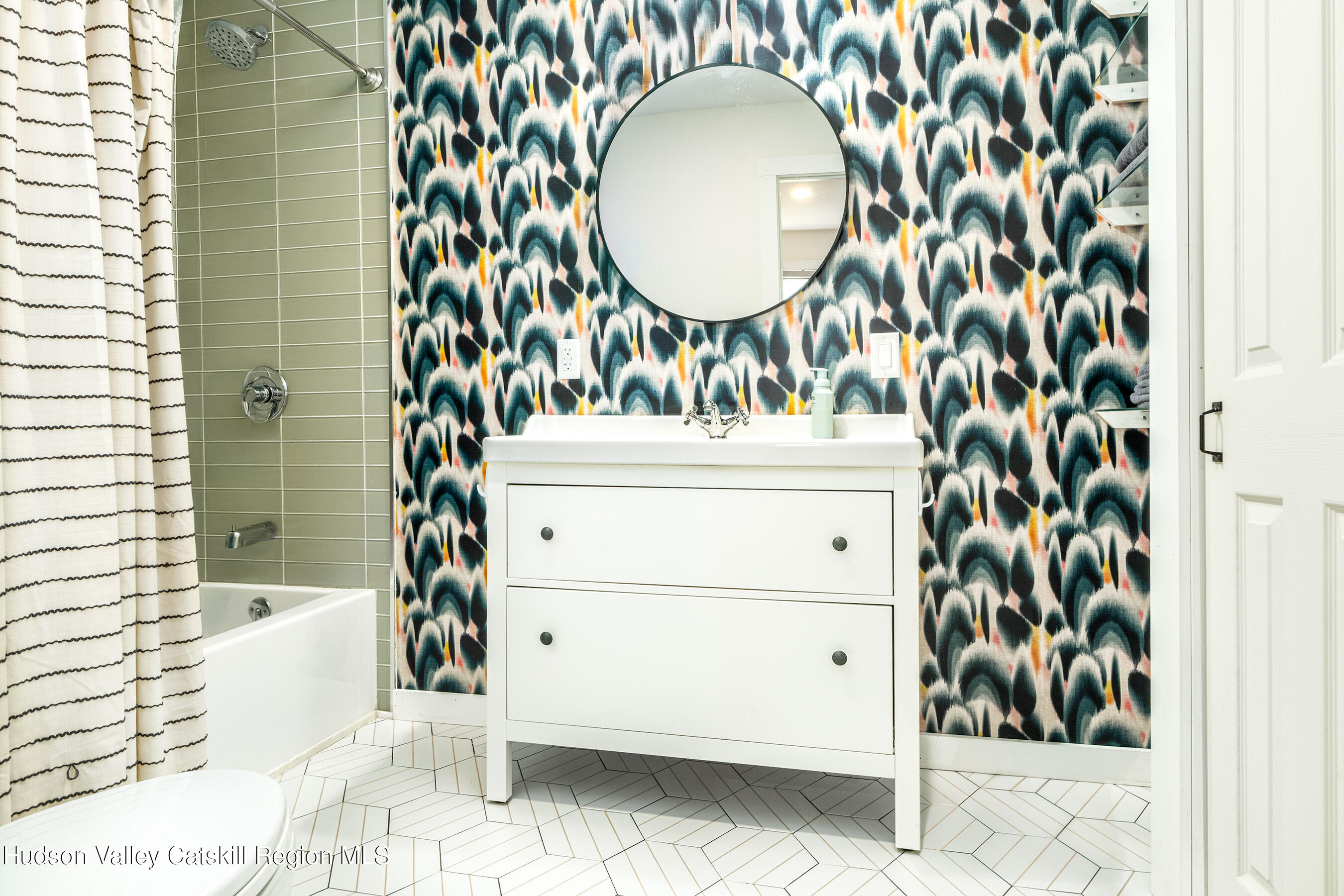 1399 Arbuckle Hollow Road Delhi, NY 13752 - Photo 25 of 64 a bathroom with a sink and a mirror