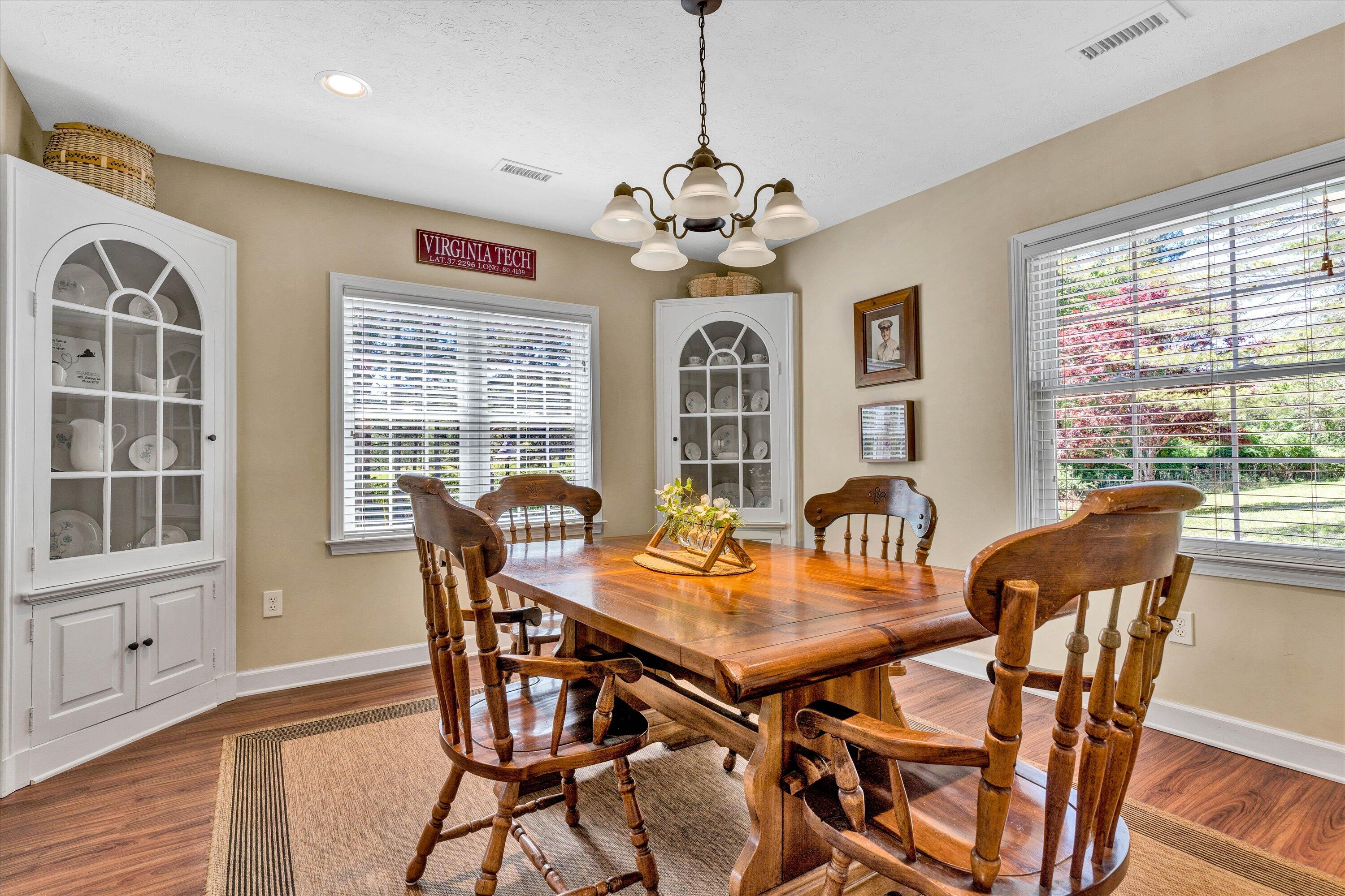 1186 Camp Jaycee Road Blue Ridge, VA 24064 - Photo 11 of 54 a view of a dining room with furniture window and outside view