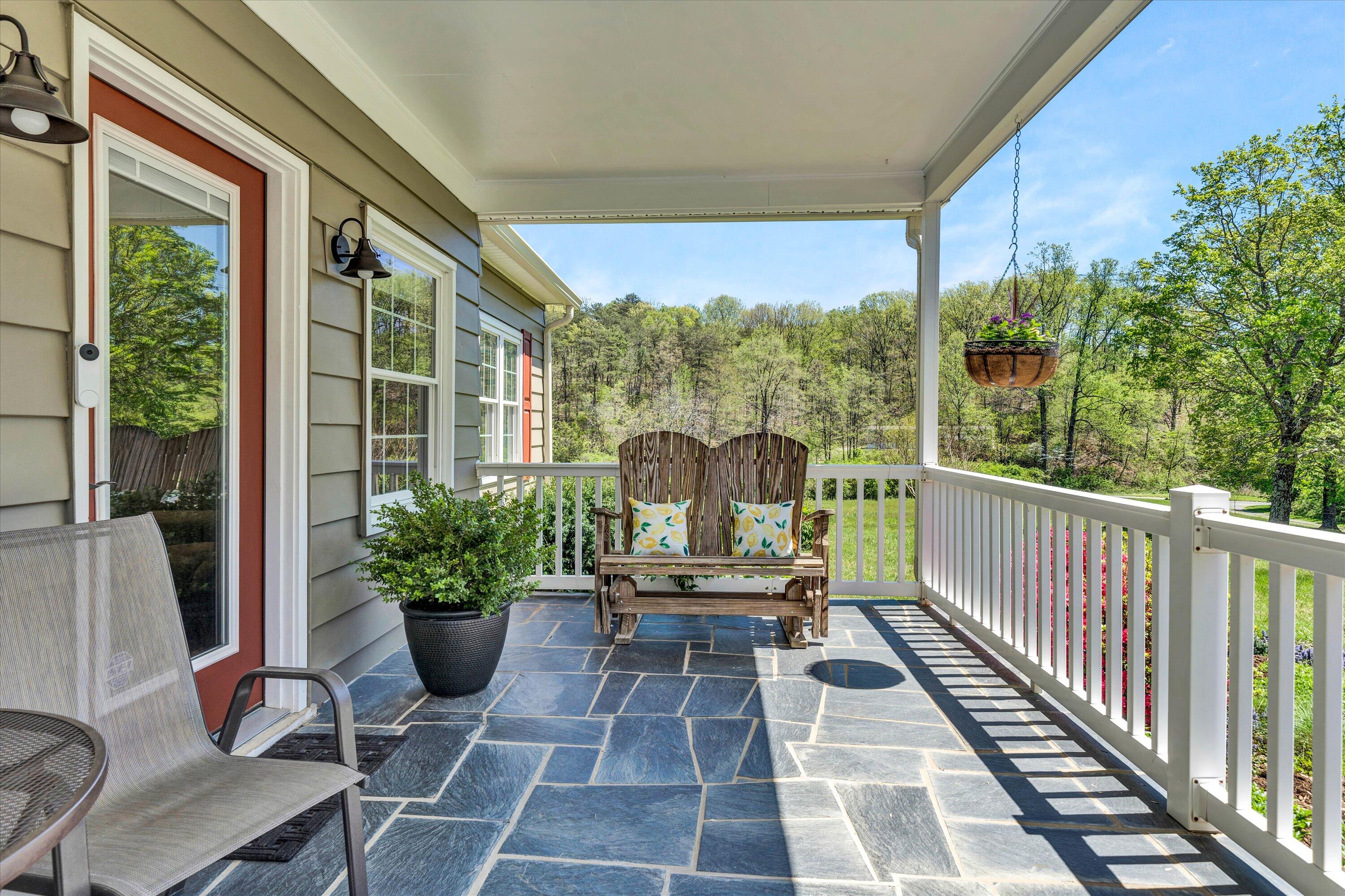 1186 Camp Jaycee Road Blue Ridge, VA 24064 - Photo 4 of 54 a view of a balcony with chairs