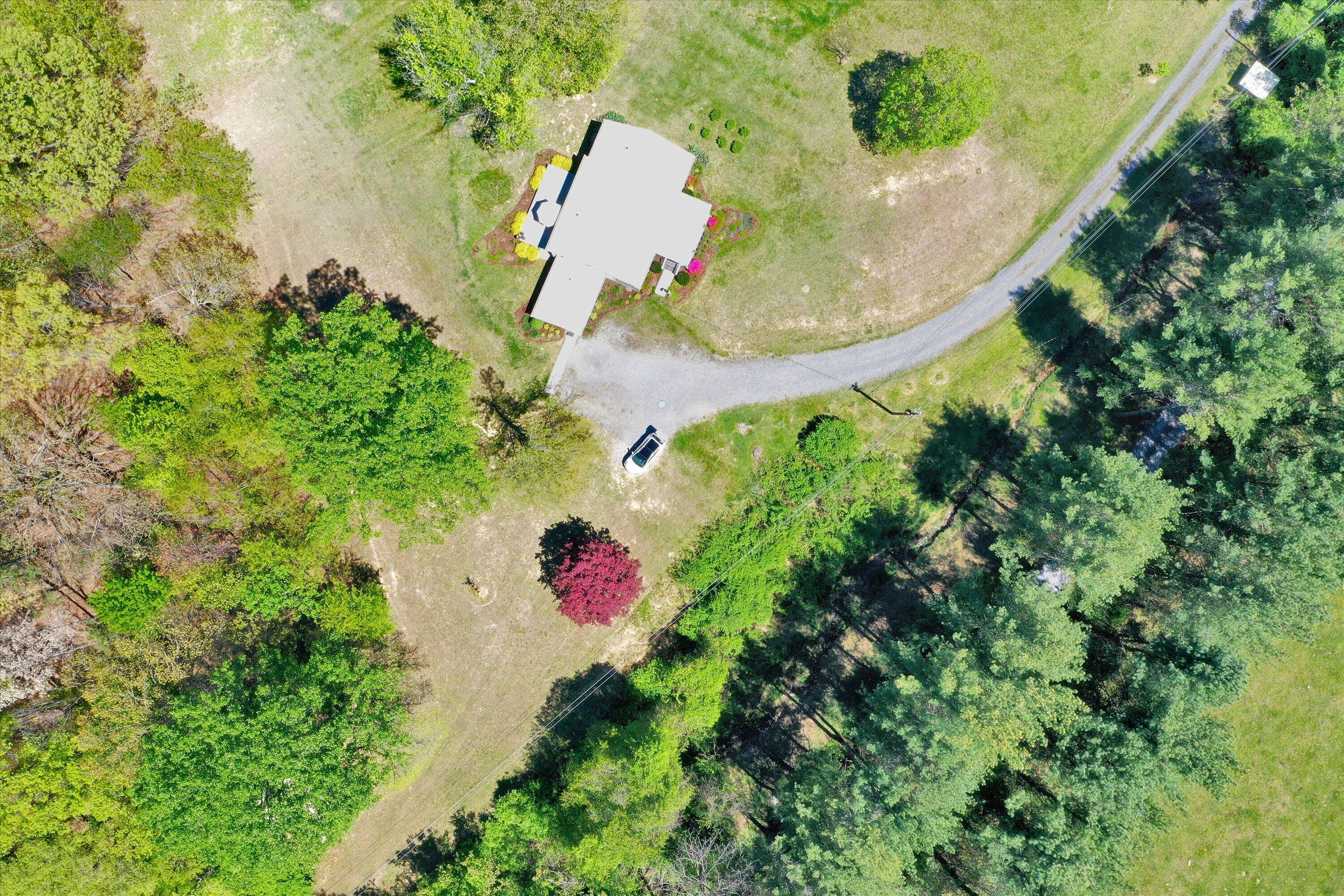 1186 Camp Jaycee Road Blue Ridge, VA 24064 - Photo 51 of 54 an aerial view of a house with a yard and a fountain