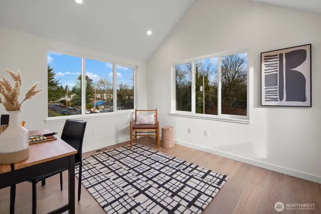 a view of a patio with table and chairs and potted plants