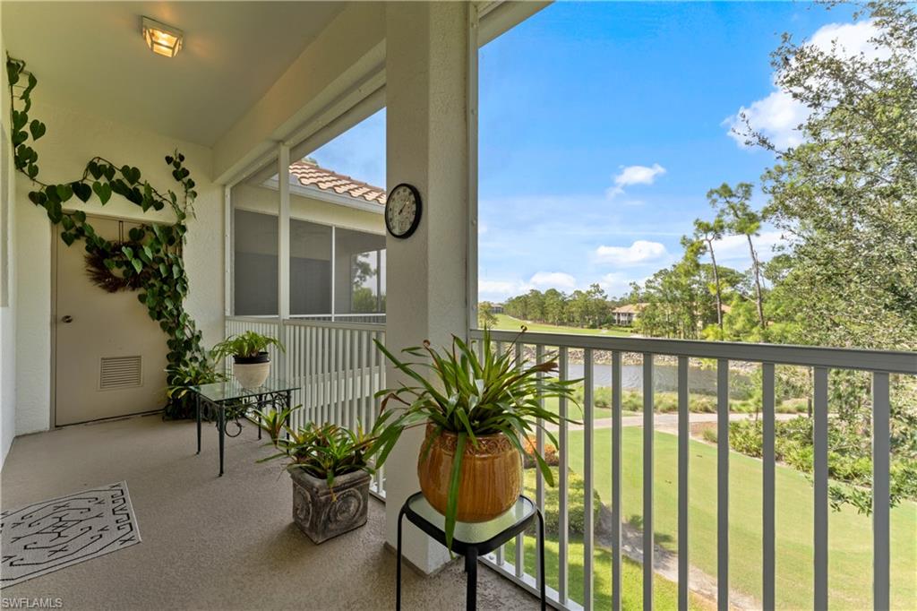 8217 Parkstone Place, Unit 308 Naples, FL 34120 - Photo 35 of 50 a view of balcony with furniture