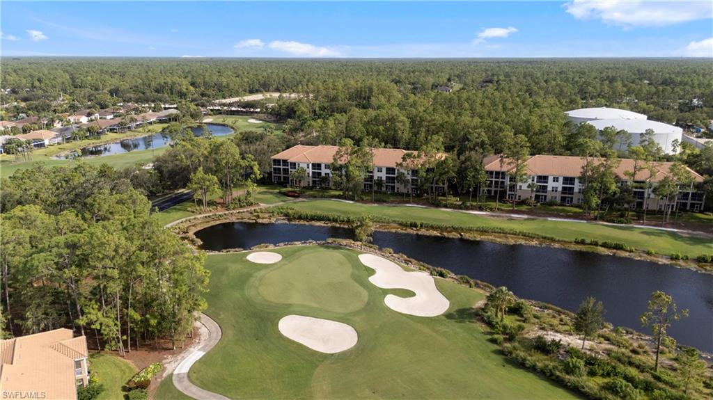 8217 Parkstone Place, Unit 308 Naples, FL 34120 - Photo 38 of 50 an aerial view of residential houses with outdoor space and lake view