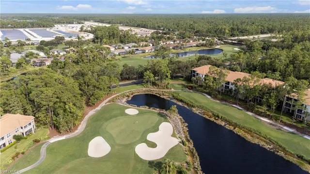 a dining hall with lots of furniture and appliances