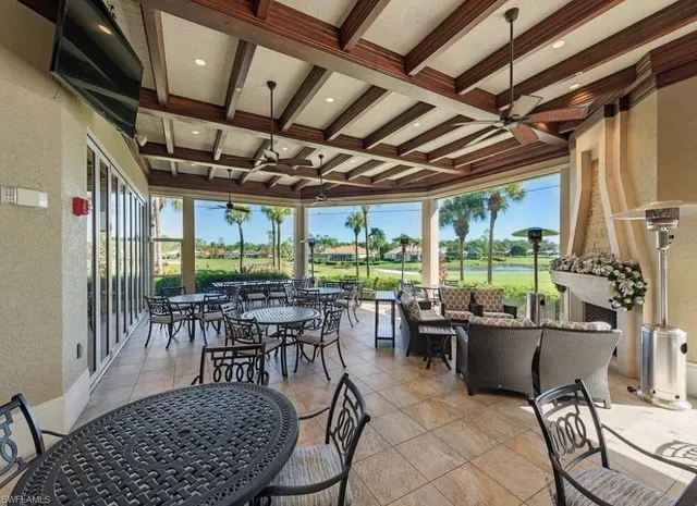 a kitchen with a sink cabinets and window
