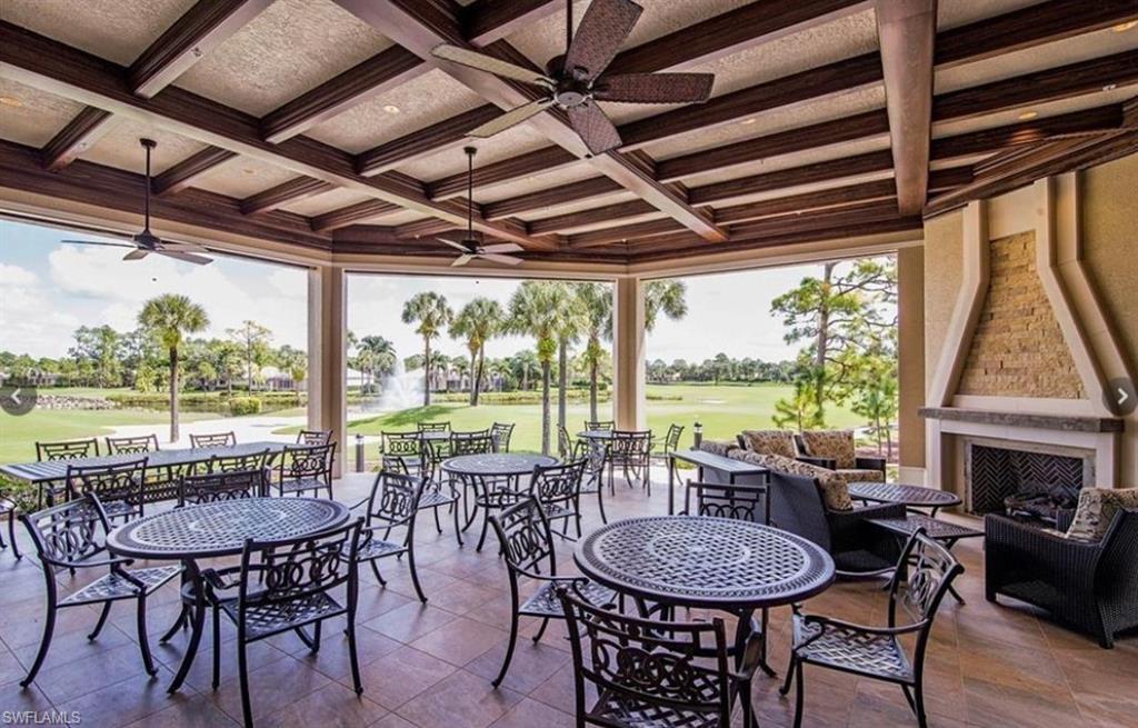 8217 Parkstone Place, Unit 308 Naples, FL 34120 - Photo 44 of 50 a view of a dining room with furniture window and outside view