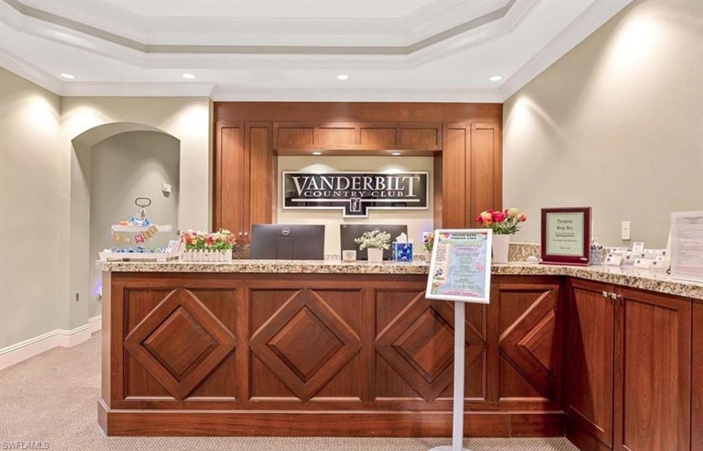 8217 Parkstone Place, Unit 308 Naples, FL 34120 - Photo 46 of 50 a kitchen with a sink cabinets and window