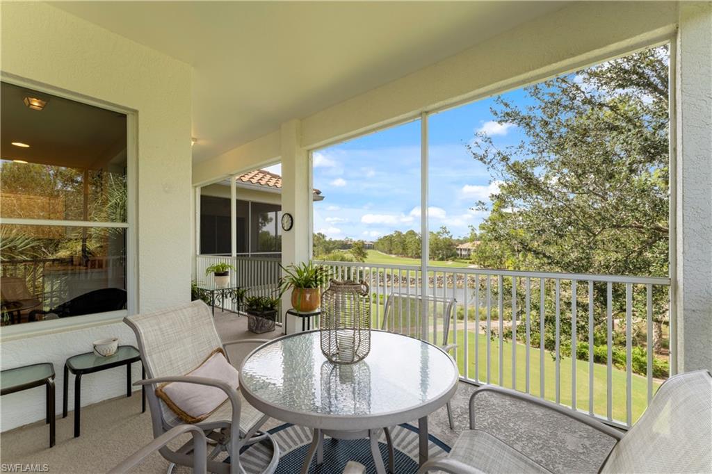 8217 Parkstone Place, Unit 308 Naples, FL 34120 - Photo 5 of 50 a outdoor space with furniture