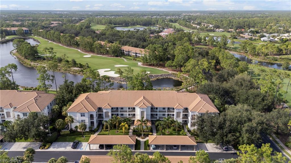 8217 Parkstone Place, Unit 308 Naples, FL 34120 - Photo 6 of 50 an aerial view of multiple house