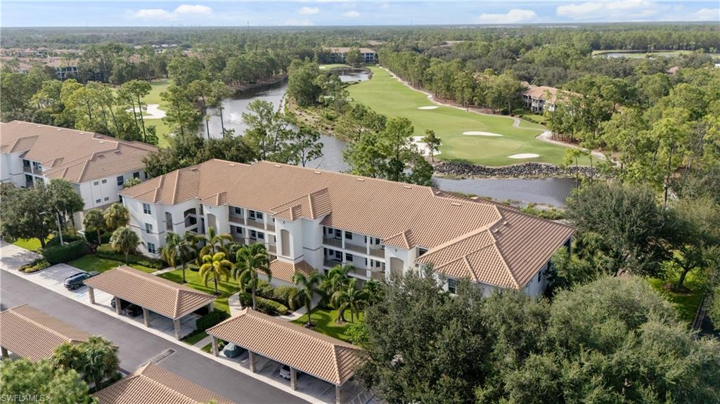 8217 Parkstone Place, Unit 308 Naples, FL 34120 - Photo 7 of 50 an aerial view of a house with a garden and mountain view