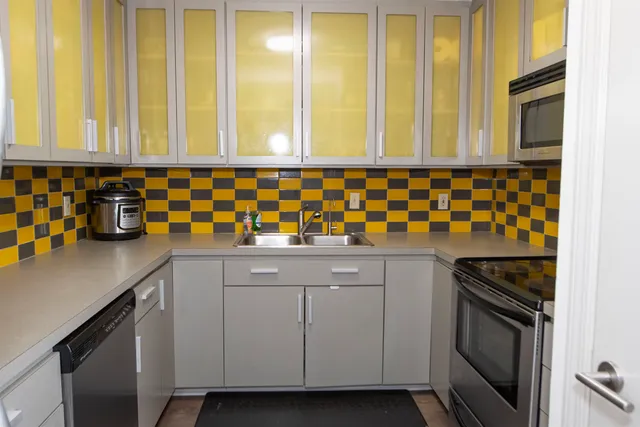 a living room with a couch and a window