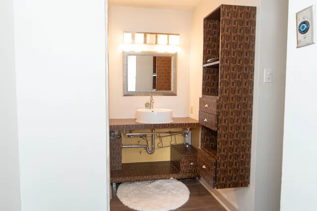 a living room with a couch and a flat screen tv