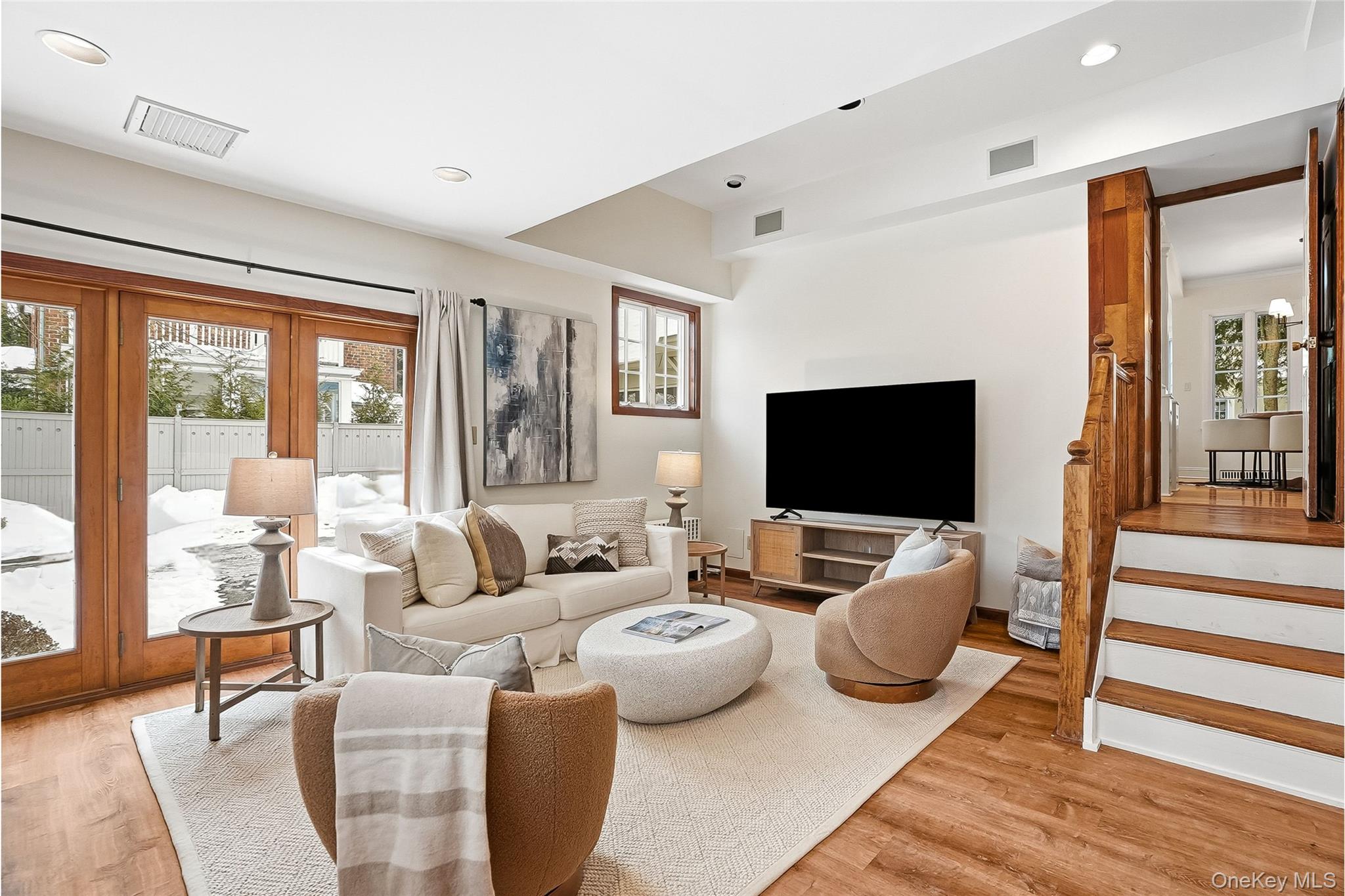 1 Oneida Street Rye, NY 10580 - Photo 15 of 32 a living room with furniture wooden floor and a flat screen tv
