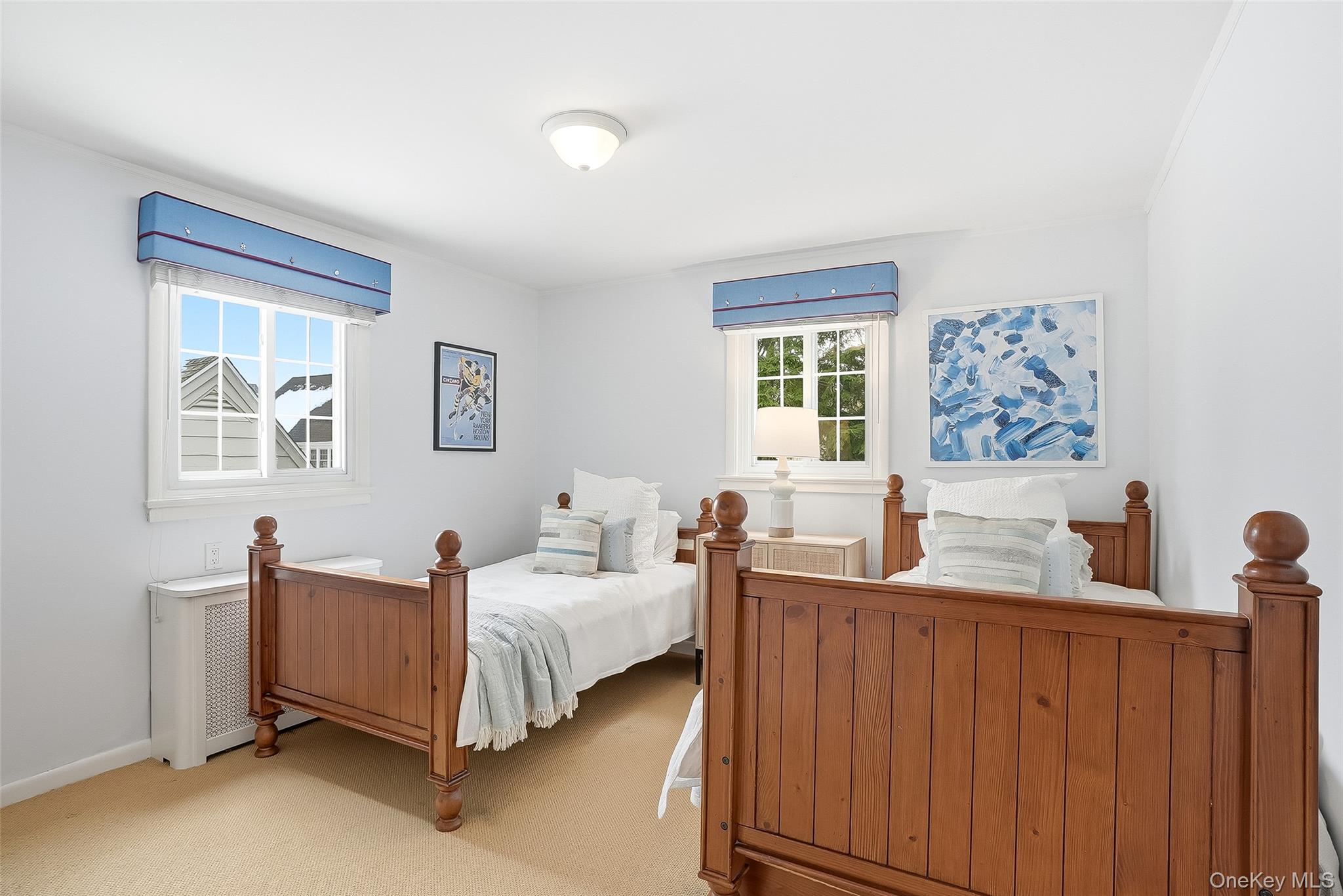 1 Oneida Street Rye, NY 10580 - Photo 20 of 32 a bedroom with bed and window