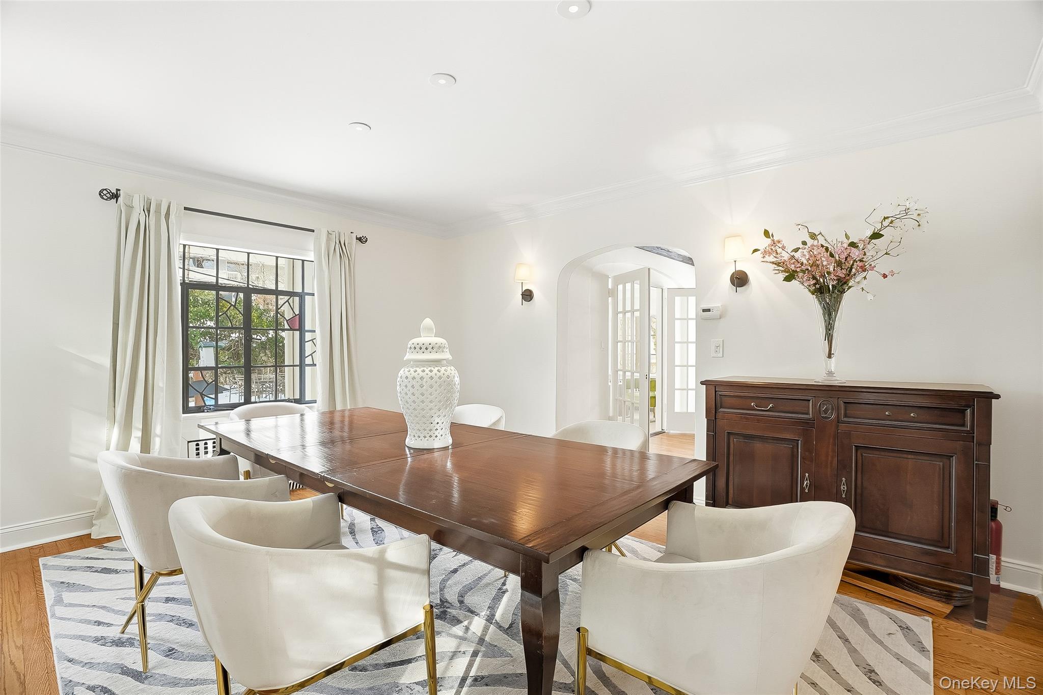 1 Oneida Street Rye, NY 10580 - Photo 8 of 32 a view of a dining room with furniture window and outside view