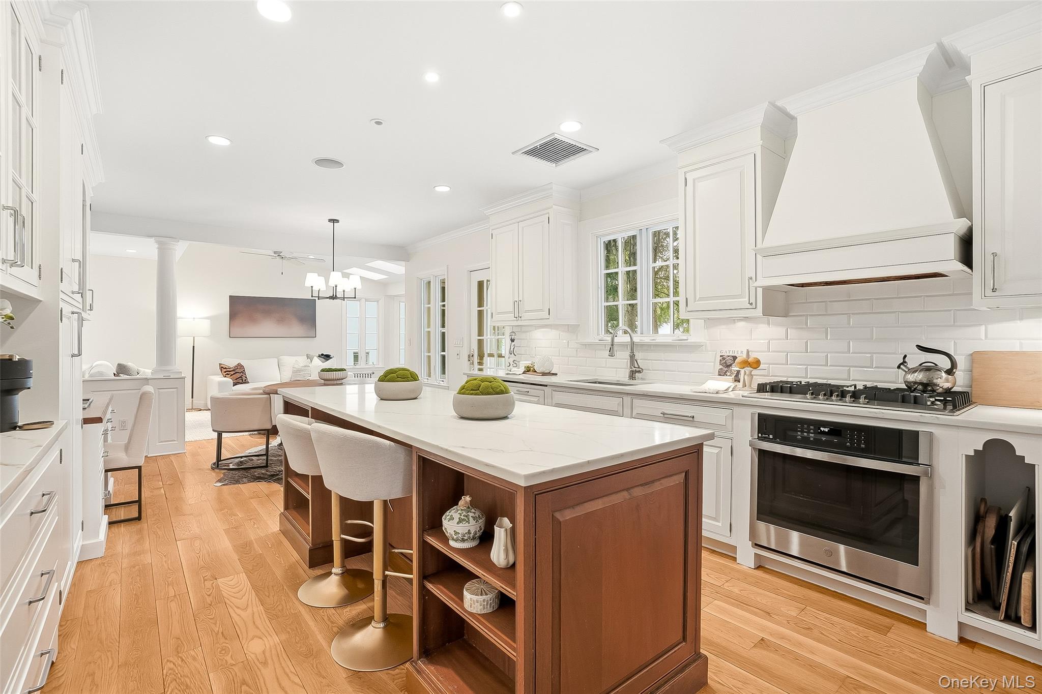1 Oneida Street Rye, NY 10580 - Photo 10 of 32 a kitchen with a stove a sink and a refrigerator