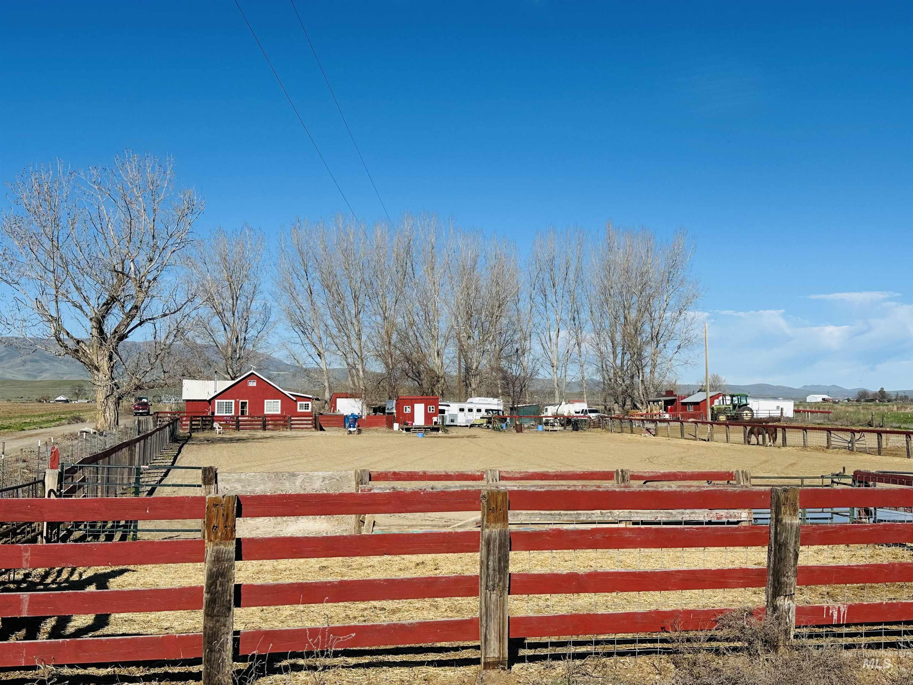 5051 South Rd J Vale, OR 97918 - Photo 24 of 49 View of yard with a rural view and an outdoor riding arena
