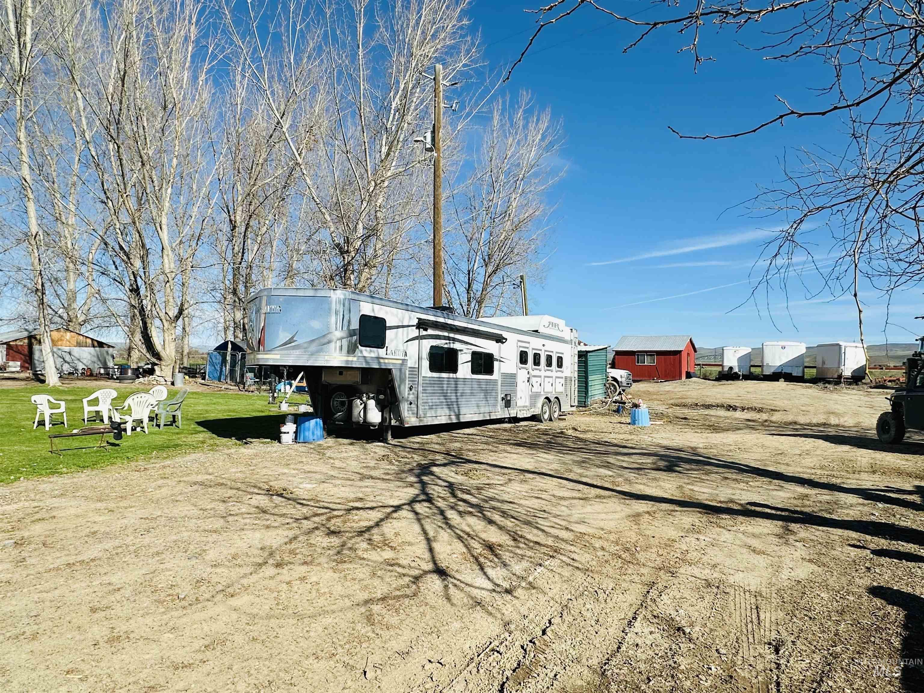 5051 South Rd J Vale, OR 97918 - Photo 40 of 49 View of front of property with a front yard and a residential view