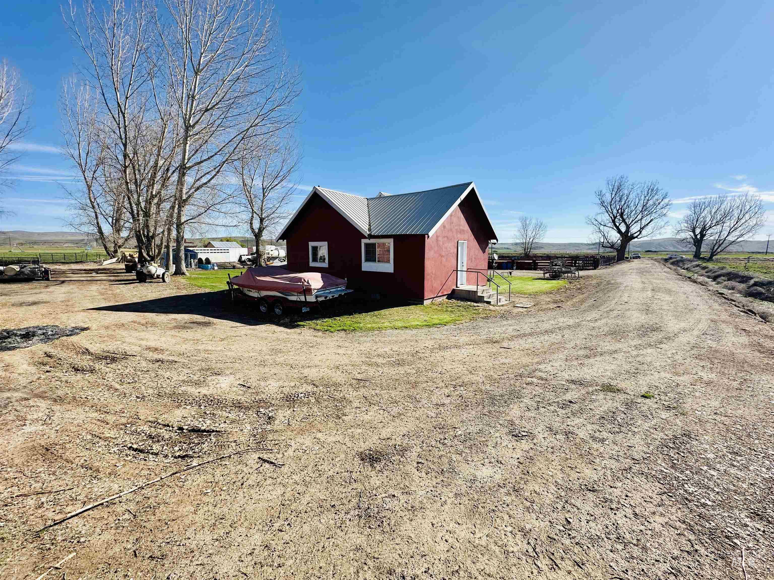 5051 South Rd J Vale, OR 97918 - Photo 46 of 49 View of side of home with a metal roof