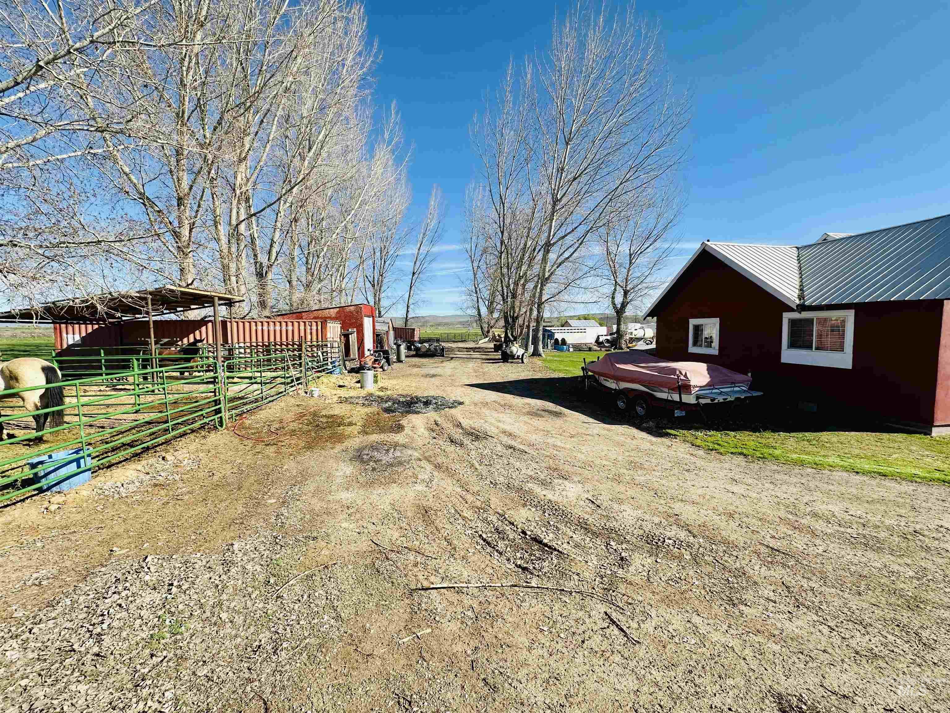 5051 South Rd J Vale, OR 97918 - Photo 47 of 49 View of yard with an outdoor structure and an exterior structure