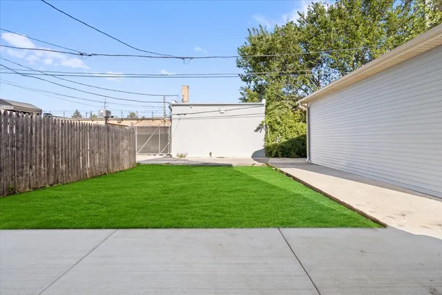 a view of a backyard with a garden