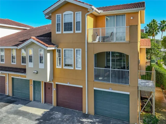 a front view of a house with large windows