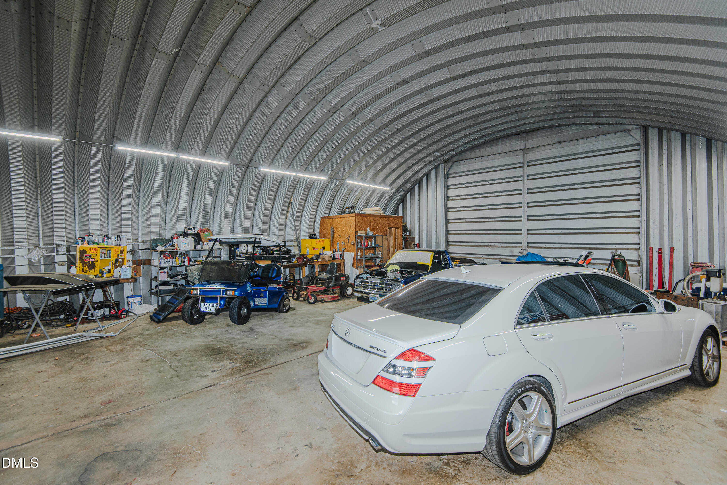 4443 Mebane Oaks Road Mebane, NC 27302 - Photo 15 of 17 a car parked in a garage