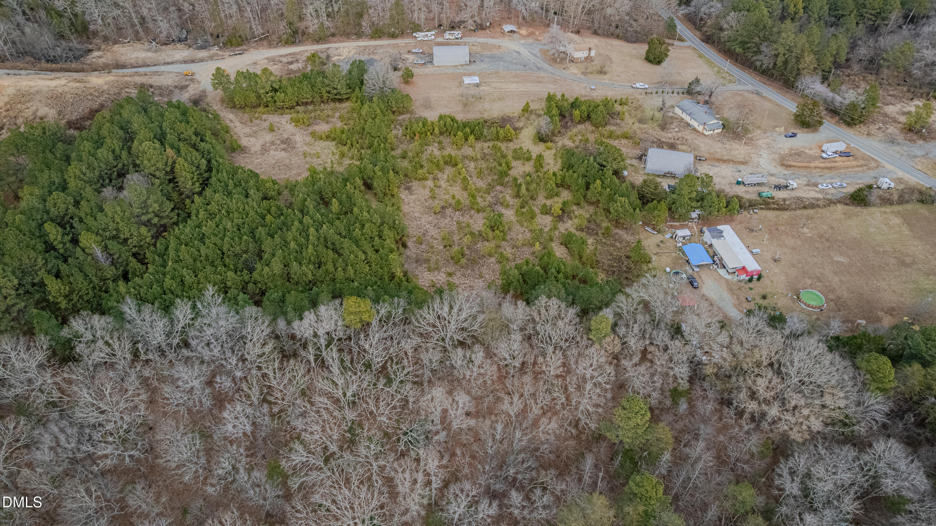 4443 Mebane Oaks Road Mebane, NC 27302 - Photo 7 of 17 a view of a dry yard with lots of green space