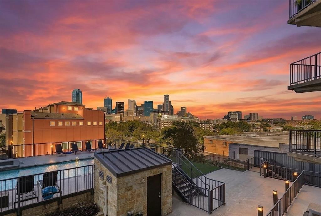 1001 Belleview Street, Unit 307 Dallas, TX 75215 - Photo 2 of 40 a view of a city with a building in the background