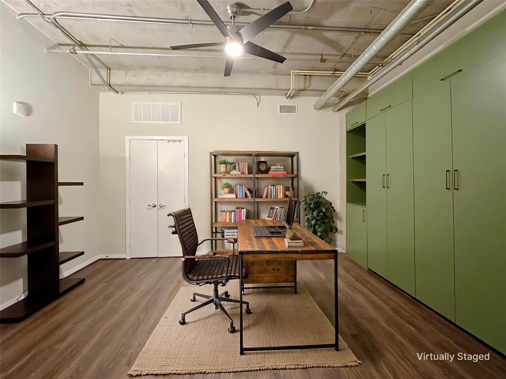 1001 Belleview Street, Unit 307 Dallas, TX 75215 - Photo 9 of 40 a workspace with furniture