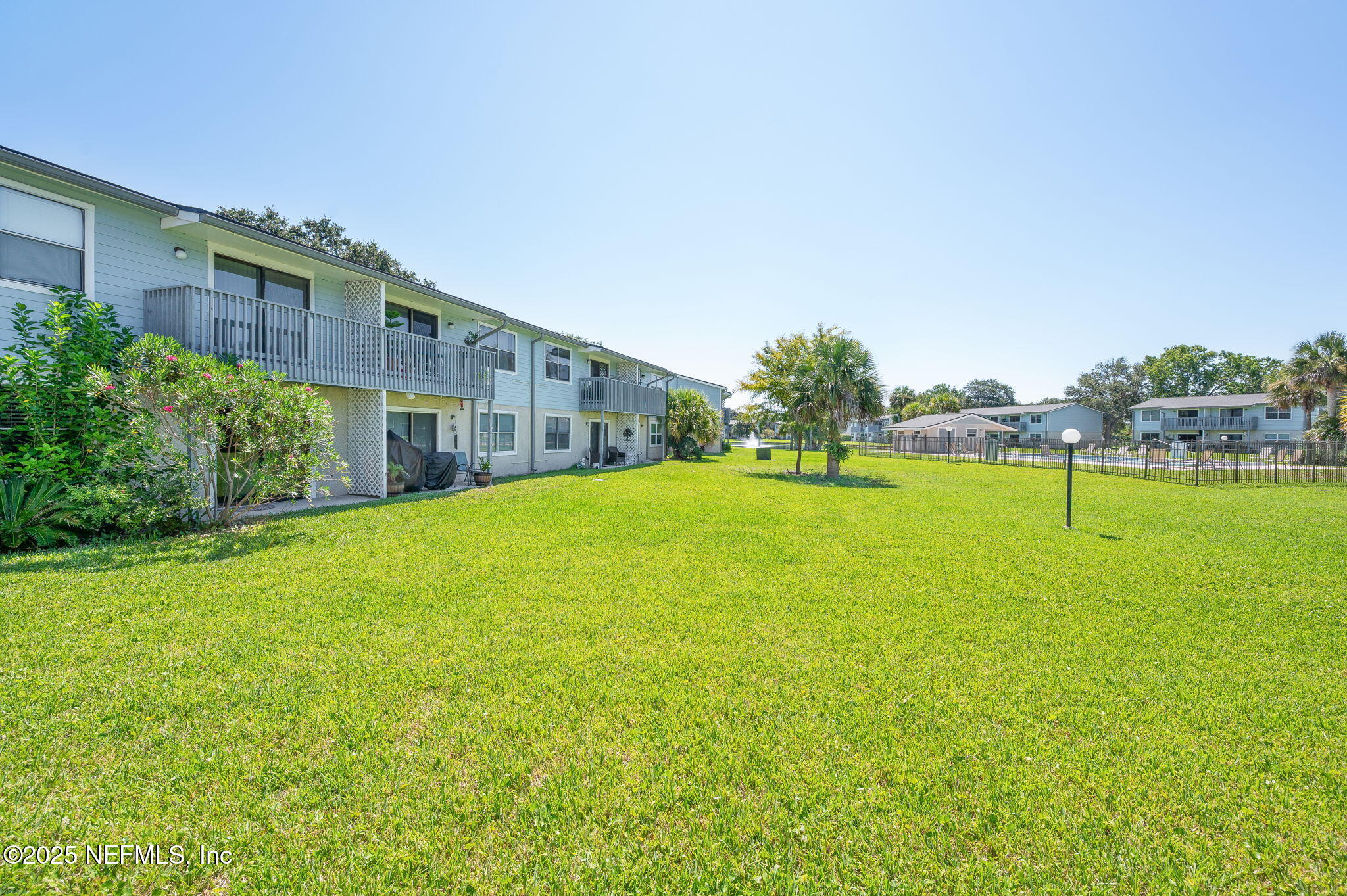 700 West Pope Road, Unit M103 St. Augustine, FL 32080 - Photo 24 of 30 a view of a house with a big yard