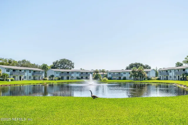 a view of an ocean with city