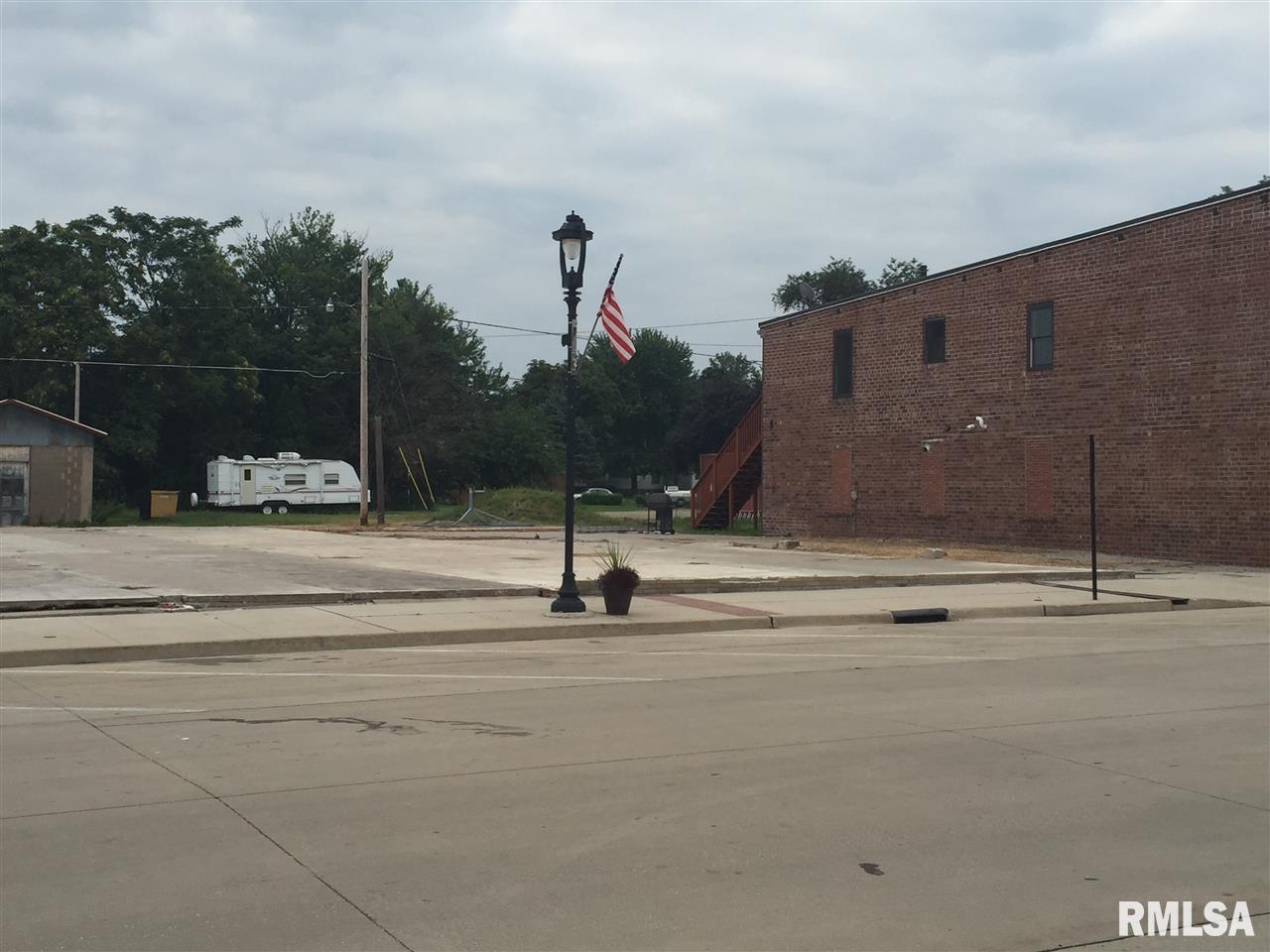 a view of road with building exterior