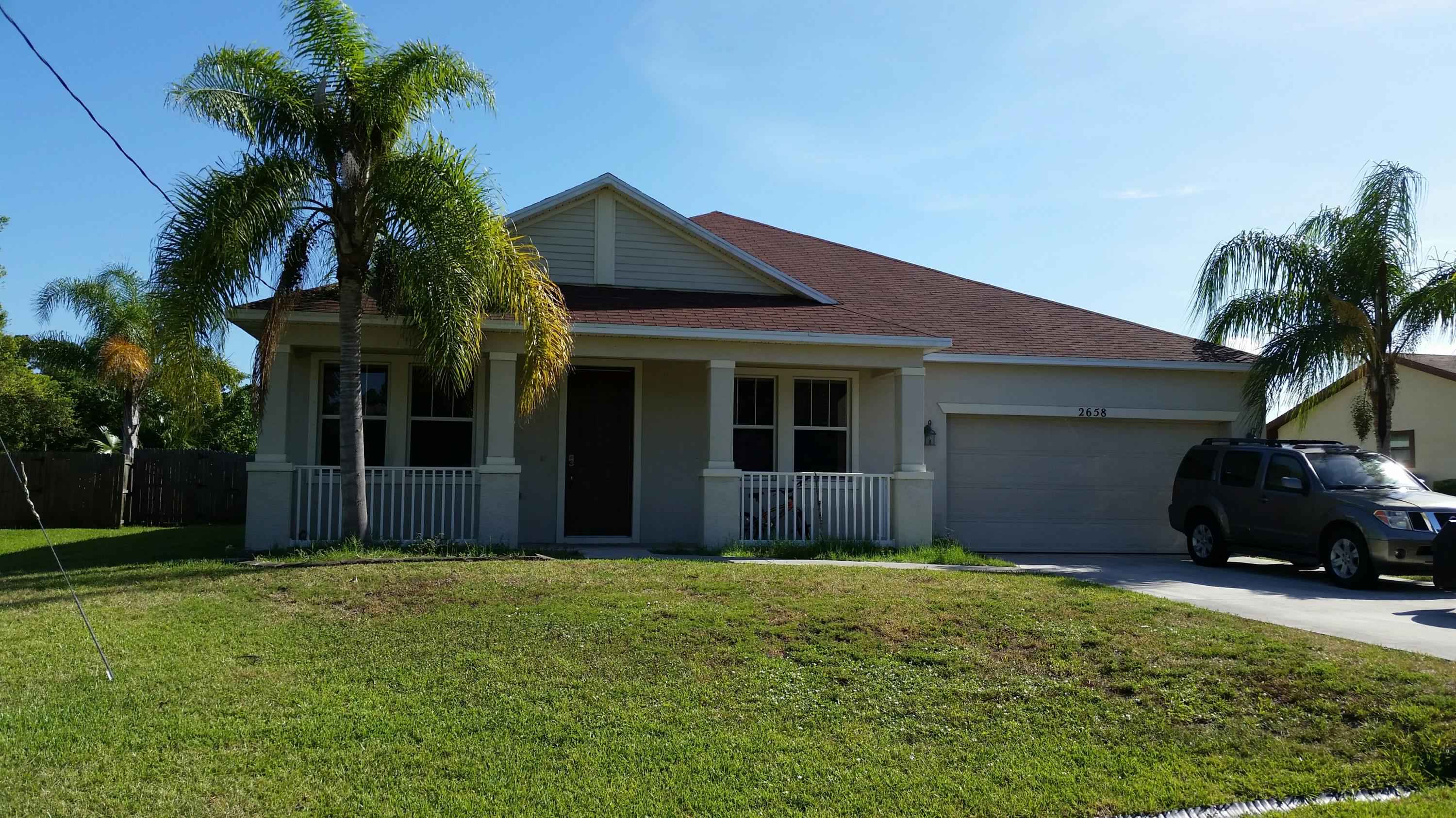 2658 Southwest Ace Road Port St. Lucie, FL 34953 - Photo 1 of 16 Front
