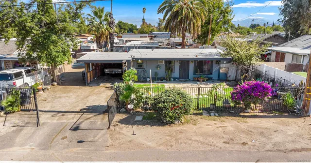 a view of a swimming pool with a patio