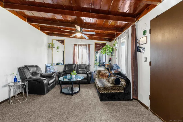 a livingroom with furniture and a couch