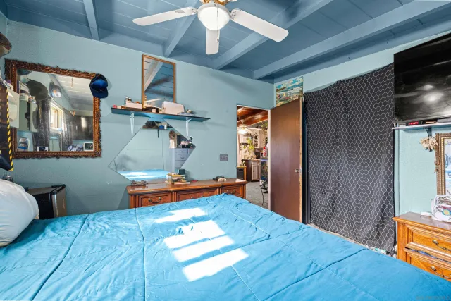 a room with furniture and a flat screen tv