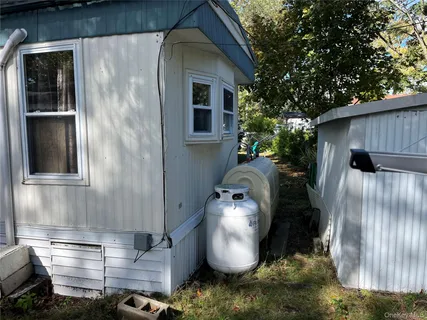 a view of a back yard of the house