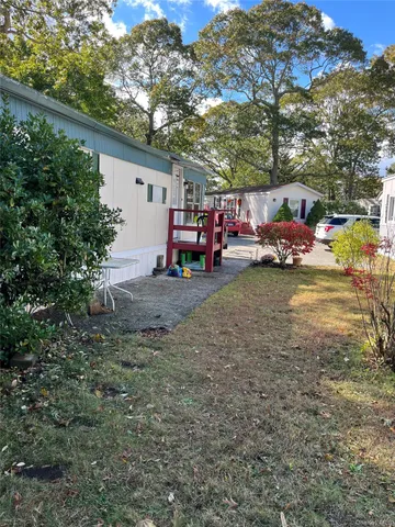 a view of a cars in front of a house