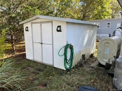 a view of a back yard of the house