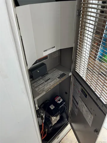 a view of appliances and utility room