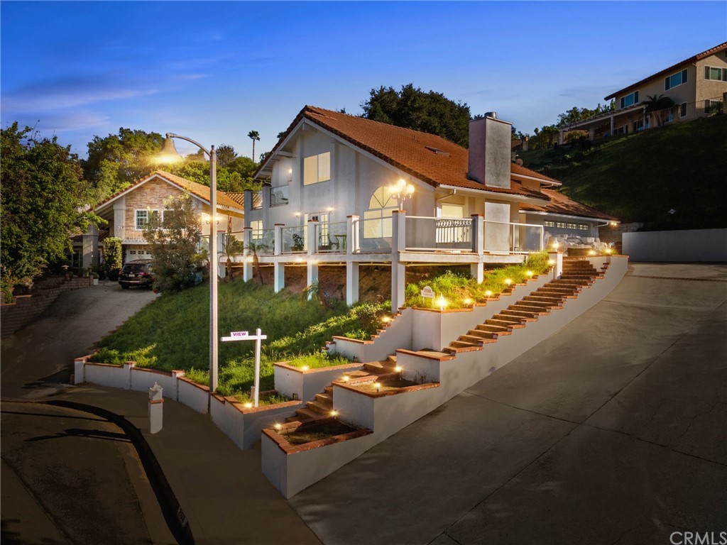 20568 Starshine Road Walnut, CA 91789 - Photo 1 of 1 a view of a house with backyard porch and sitting area