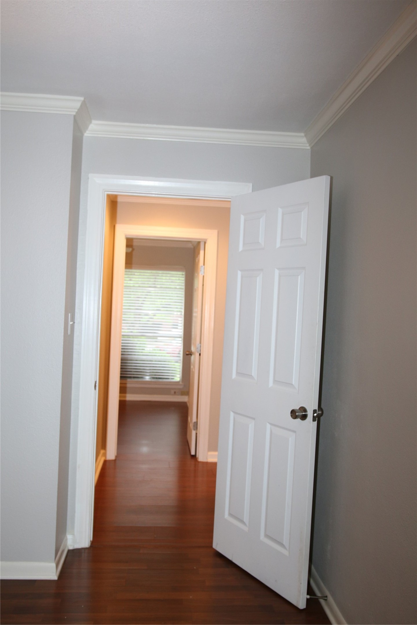 700 Castle Ridge Road, Unit A Austin, TX 78746 - Photo 18 of 34 a view of a hallway with wooden floor