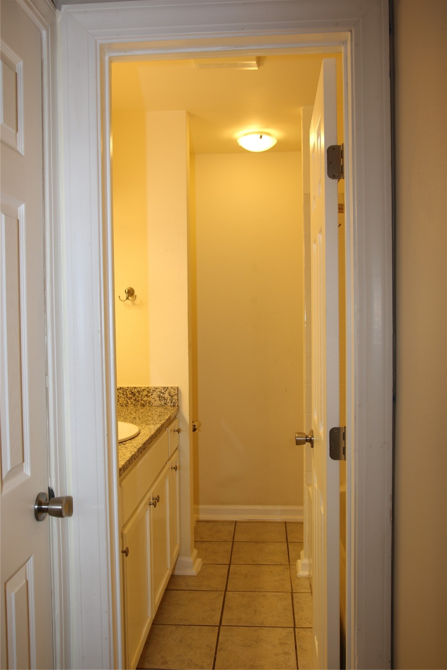 700 Castle Ridge Road, Unit A Austin, TX 78746 - Photo 28 of 34 a view of a bathroom with a tub