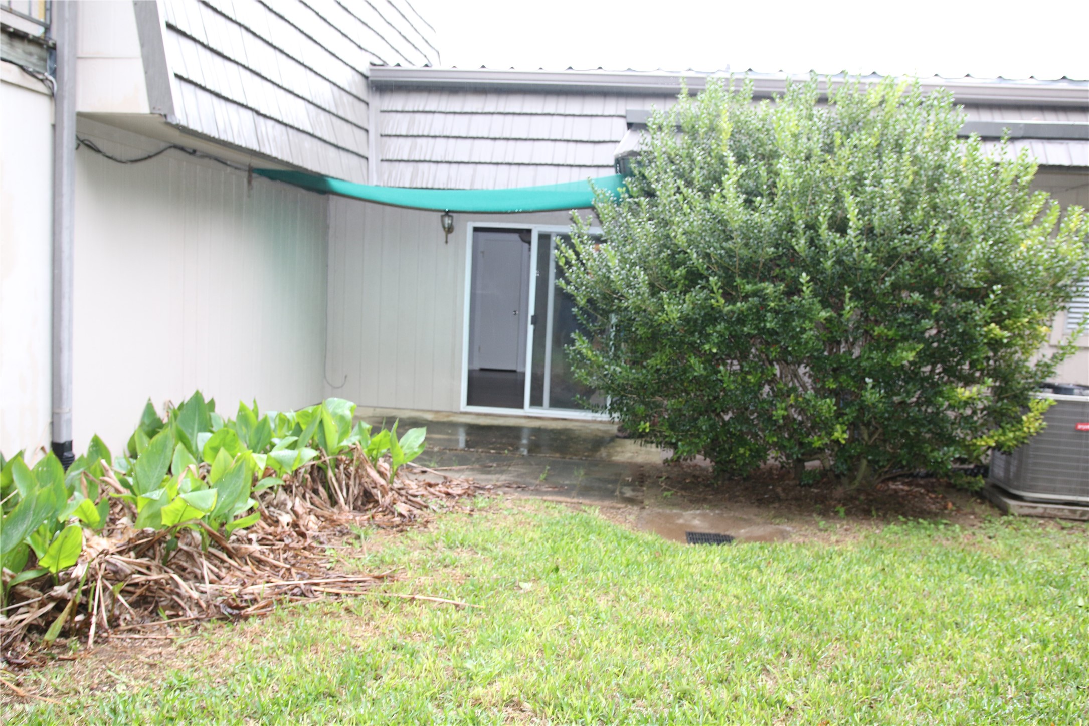 700 Castle Ridge Road, Unit A Austin, TX 78746 - Photo 31 of 34 a backyard of a house with lots of green space and outdoor seating