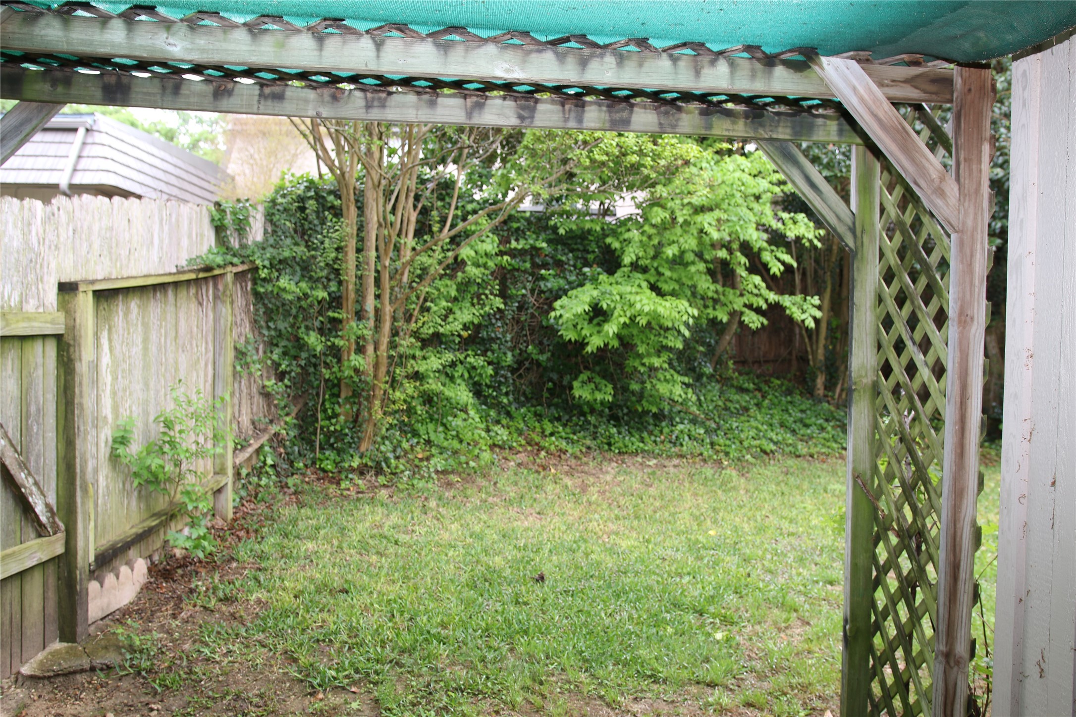 700 Castle Ridge Road, Unit A Austin, TX 78746 - Photo 32 of 34 a view of a yard with plants