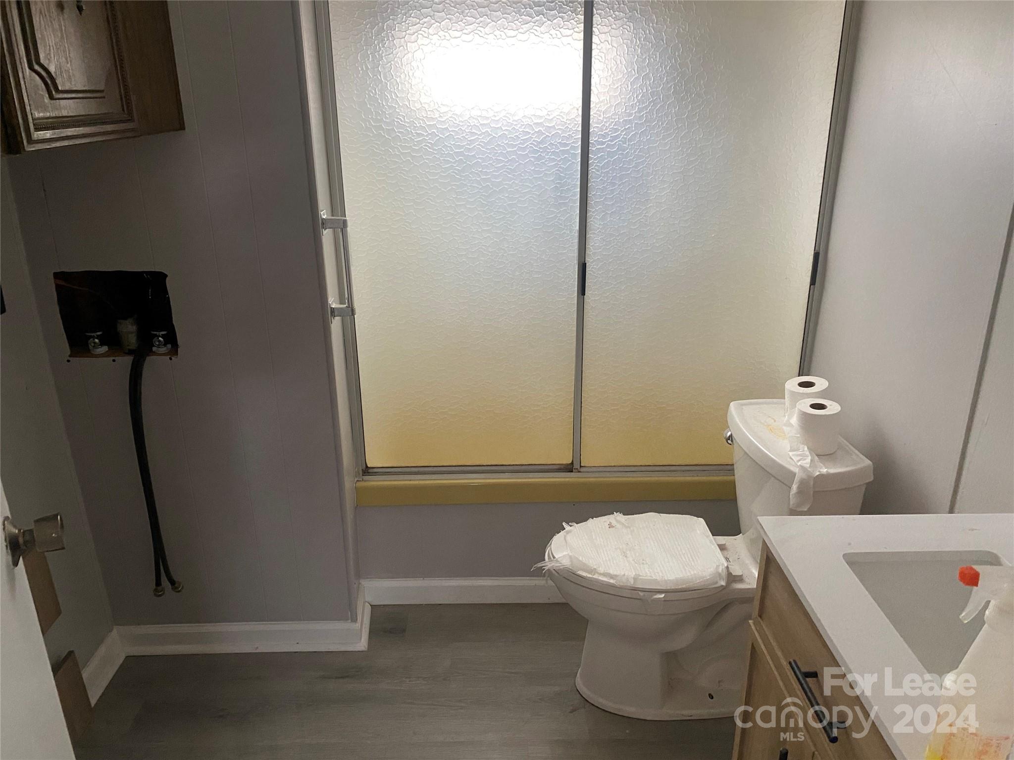 116 Lowman Street, Unit 6 Rutherford College, NC 28690 - Photo 7 of 7 a bathroom with a toilet and a shower
