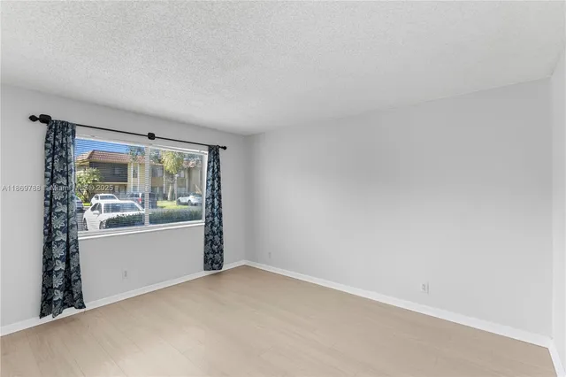 an empty room with window